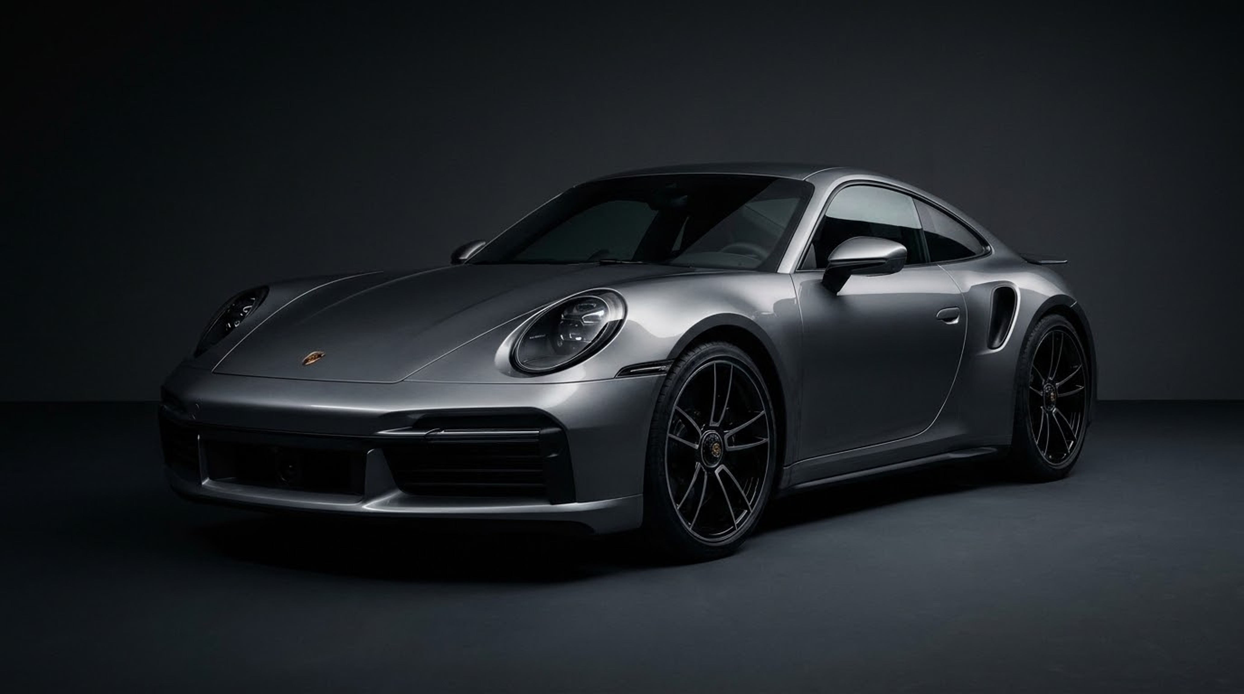 Porsche 911 Turbo S — studio sombre
